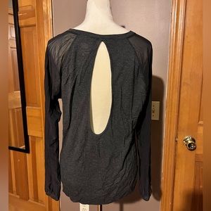 Women’s open back athletic top.